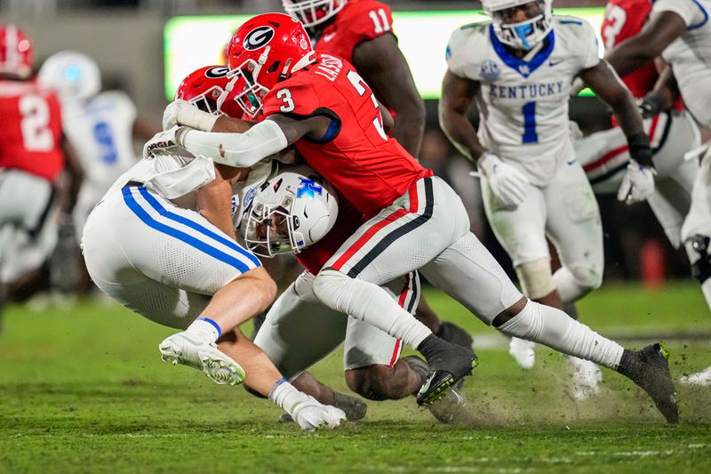 Oct 7, 2023; Athens, Georgia, USA; Georgia Bulldogs defensive back Kamari Lassiter (3) tackles Kentucky Wildcats quarterback Devin Leary (13) at Sanford Stadium. Mandatory Credit: Dale Zanine-USA TODAY Sports