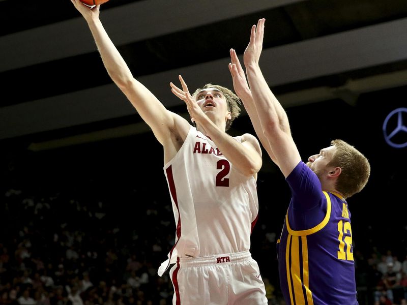 Jan 27, 2024; Tuscaloosa, Alabama, USA;  Alabama forward Grant Nelson (2) scores inside against LSU forward Hunter Dean (12) at Coleman Coliseum. Mandatory Credit: Gary Cosby Jr.-USA TODAY Sports