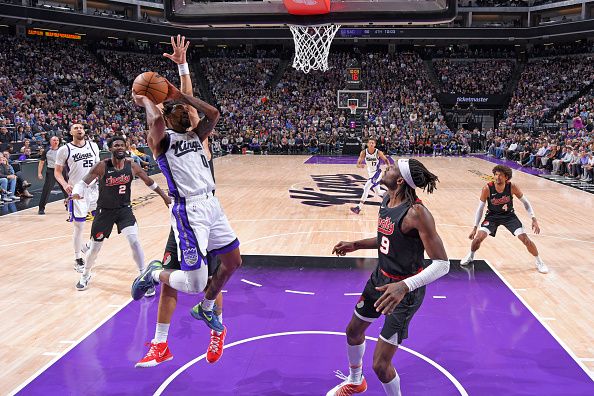 SACRAMENTO, CA - NOVEMBER 8: Malik Monk #0 of the Sacramento Kings shoots the ball during the game  against the Portland Trail Blazers on November 8, 2023 at Golden 1 Center in Sacramento, California. NOTE TO USER: User expressly acknowledges and agrees that, by downloading and or using this Photograph, user is consenting to the terms and conditions of the Getty Images License Agreement. Mandatory Copyright Notice: Copyright 2023 NBAE (Photo by Rocky Widner/NBAE via Getty Images)