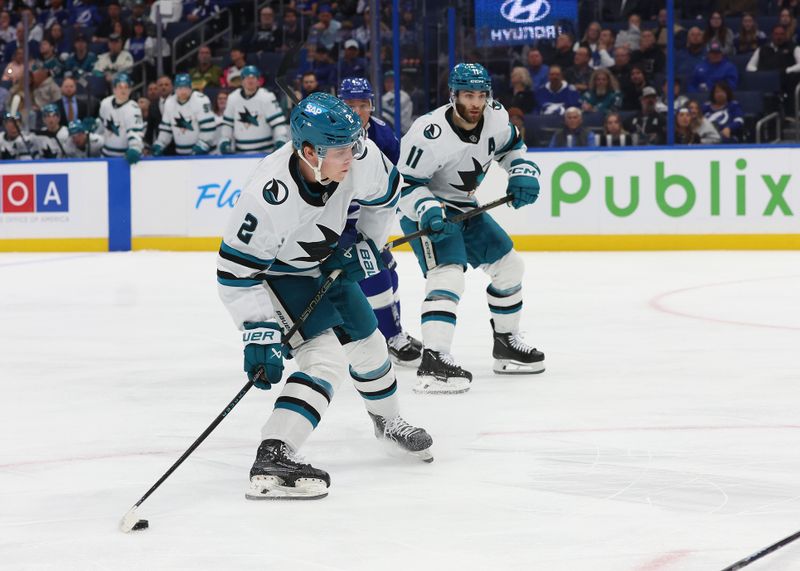 Dec 5, 2024; Tampa, Florida, USA; San Jose Sharks center Will Smith (2) shoots against the Tampa Bay Lightning during the second period at Amalie Arena. Mandatory Credit: Kim Klement Neitzel-Imagn Images