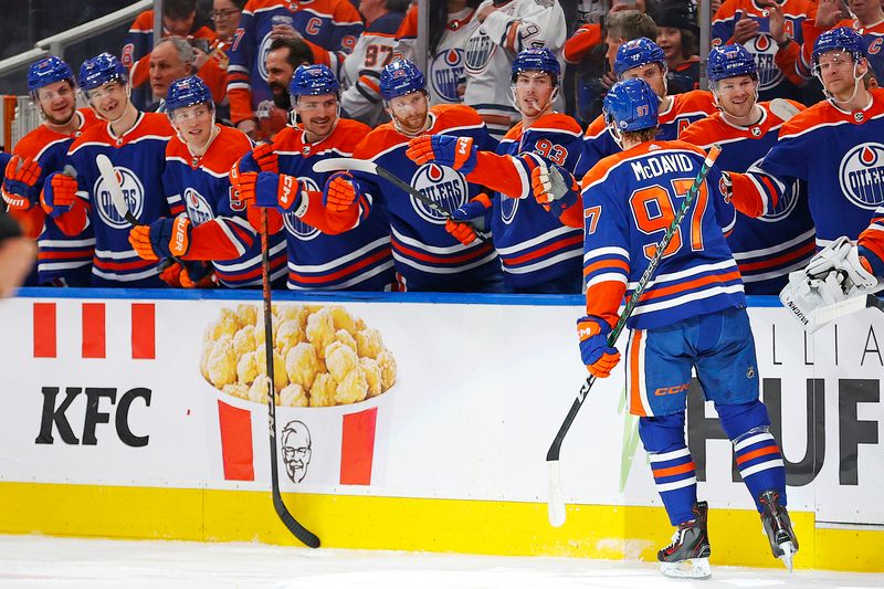 Apr 15, 2024; Edmonton, Alberta, CAN; The Edmonton Oilers celebrate a goal scored by forward Connor McDavid (97) during the first period against the San Jose Sharks at Rogers Place. Mandatory Credit: Perry Nelson-USA TODAY Sports