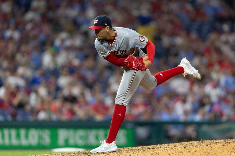 Aug 15, 2024; Philadelphia, Pennsylvania, USA; Washington Nationals pitcher Orlando Ribalta (64) throws a pitch during the eighth inning against the Philadelphia Phillies at Citizens Bank Park. Mandatory Credit: Bill Streicher-USA TODAY Sports