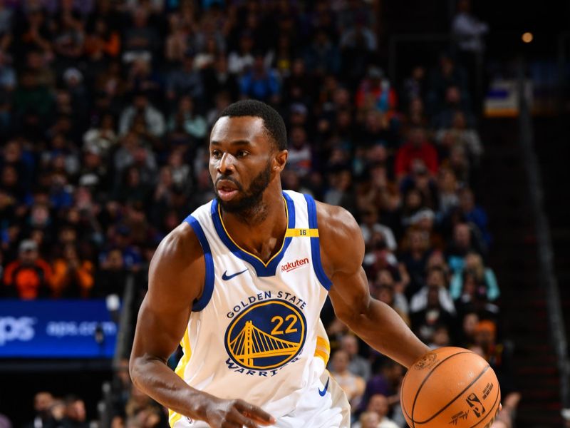 PHOENIX, AZ - NOVEMBER 30: Andrew Wiggins #22 of the Golden State Warriors dribbles the ball during the game against the Phoenix Suns on November 30, 2024 at Footprint Center in Phoenix, Arizona. NOTE TO USER: User expressly acknowledges and agrees that, by downloading and or using this photograph, user is consenting to the terms and conditions of the Getty Images License Agreement. Mandatory Copyright Notice: Copyright 2024 NBAE (Photo by Barry Gossage/NBAE via Getty Images)