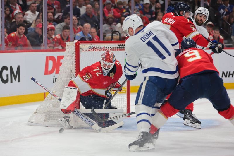 May 9, 2025; Sunrise, Florida, USA; Florida Panthers goaltender Sergei Bobrovsky (72) makes a save against Toronto Maple Leafs center Max Domi (11) during the third period in game three of the second round of the 2025 Stanley Cup Playoffs at Amerant Bank Arena. Mandatory Credit: Sam Navarro-Imagn Images