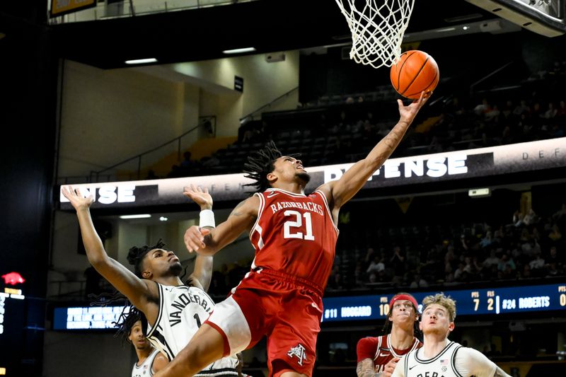 Mar 4, 2025; Nashville, Tennessee, USA; Vanderbilt Commodores guard Hollman Smith (21) lays the ball in  against the Vanderbilt Commodores  during the second half at Memorial Gymnasium. Mandatory Credit: Steve Roberts-Imagn Images