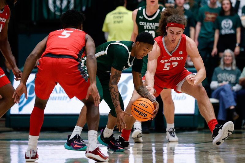 Mar 3, 2023; Fort Collins, Colorado, USA; Colorado State Rams guard Tavi Jackson (2) battles for the ball with New Mexico Lobos guard Jamal Mashburn Jr. (5) and forward Josiah Allick (53) in the second half at Moby Arena. Mandatory Credit: Isaiah J. Downing-USA TODAY Sports