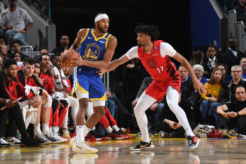 SAN FRANCISCO, CA - MARCH 10:  Moses Moody #4 of the Golden State Warriors dribbles the ball during the game against the Portland Trail Blazers on March 10, 2025 at Chase Center in San Francisco, California. NOTE TO USER: User expressly acknowledges and agrees that, by downloading and or using this photograph, user is consenting to the terms and conditions of Getty Images License Agreement. Mandatory Copyright Notice: Copyright 2025 NBAE (Photo by Noah Graham/NBAE via Getty Images)