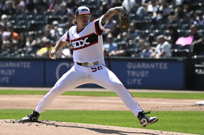 Aug 27, 2023; Chicago, Illinois, USA;  Chicago White Sox starting pitcher Mike Clevinger (52) delivers against the Oakland Athletics during the first inning at Guaranteed Rate Field. Mandatory Credit: Matt Marton-USA TODAY Sports