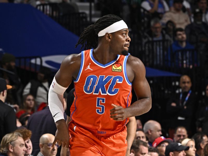 PHILADELPHIA, PA - APRIL 2: Luguentz Dort #5 of the Oklahoma City Thunder looks on during the game against the Philadelphia 76ers on April 2, 2024 at the Wells Fargo Center in Philadelphia, Pennsylvania NOTE TO USER: User expressly acknowledges and agrees that, by downloading and/or using this Photograph, user is consenting to the terms and conditions of the Getty Images License Agreement. Mandatory Copyright Notice: Copyright 2024 NBAE (Photo by David Dow/NBAE via Getty Images)