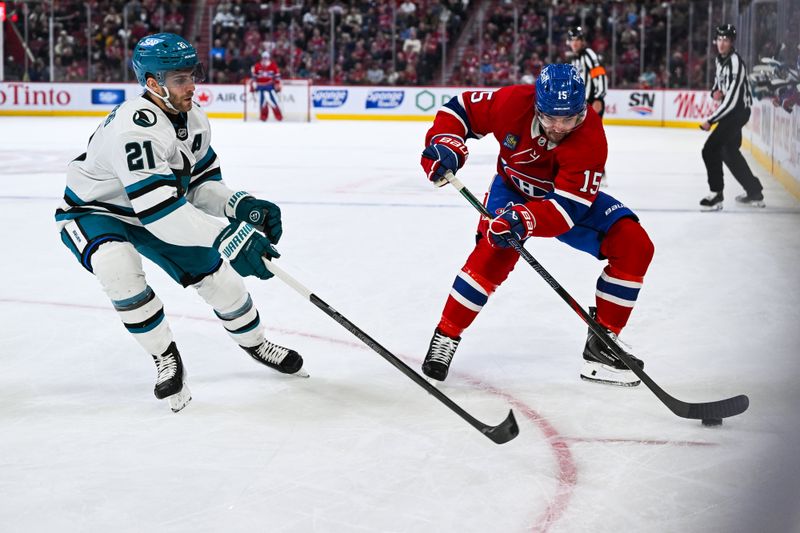 Mar 14, 2026; Montreal, Quebec, CAN; Montreal Canadiens center Alex Newhook (15) plays the puck against San Jose Sharks center Alexander Wennberg (21) during the second period at Bell Centre. Mandatory Credit: David Kirouac-Imagn Images Mar 14, 2026; Montreal, Quebec, CAN; Montreal Canadiens center Alex Newhook (15) plays the puck against San Jose Sharks center Alexander Wennberg (21) during the second period at Bell Centre. Mandatory Credit: David Kirouac-Imagn Images