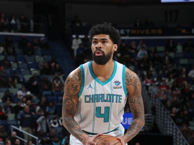 NEW ORLEANS, LA - JANUARY 17: Nick Richards #4 of the Charlotte Hornets shoots a free throw during the game against the New Orleans Pelicans on January 17, 2024 at the Smoothie King Center in New Orleans, Louisiana. NOTE TO USER: User expressly acknowledges and agrees that, by downloading and or using this Photograph, user is consenting to the terms and conditions of the Getty Images License Agreement. Mandatory Copyright Notice: Copyright 2024 NBAE (Photo by Layne Murdoch Jr./NBAE via Getty Images)