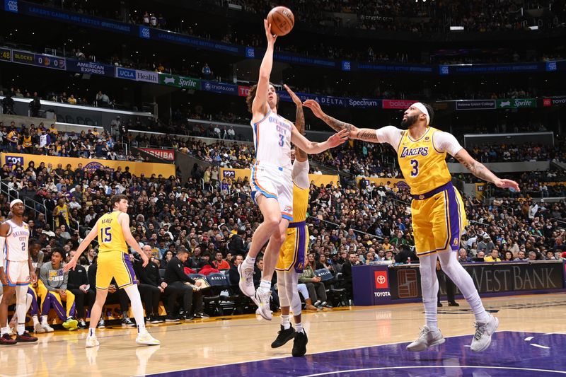 LOS ANGELES, CA - MARCH 4: Josh Giddey #3 of the Oklahoma City Thunder drives to the basket during the game against the Los Angeles Lakers on March 4, 2024 at Crypto.Com Arena in Los Angeles, California. NOTE TO USER: User expressly acknowledges and agrees that, by downloading and/or using this Photograph, user is consenting to the terms and conditions of the Getty Images License Agreement. Mandatory Copyright Notice: Copyright 2024 NBAE (Photo by Andrew D. Bernstein/NBAE via Getty Images)