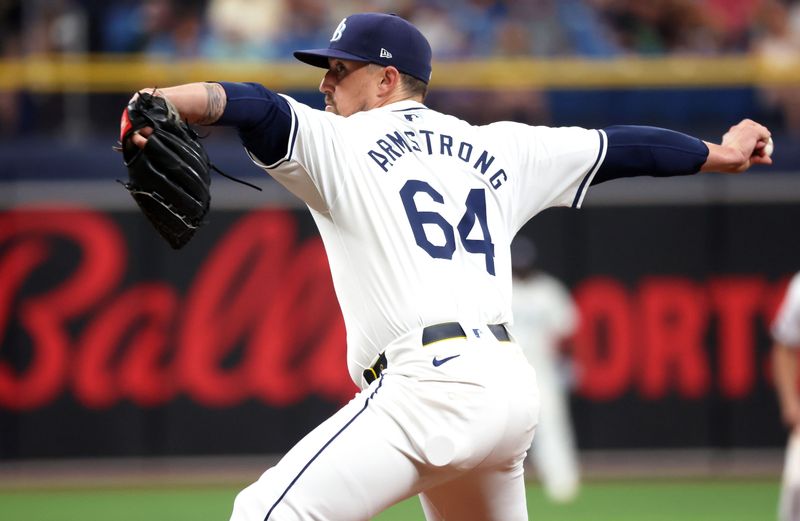 May 30, 2024; St. Petersburg, Florida, USA; Tampa Bay Rays pitcher Shawn Armstrong (64) throws a pitch against the Oakland Athletics during the second inning  at Tropicana Field. Mandatory Credit: Kim Klement Neitzel-USA TODAY Sports