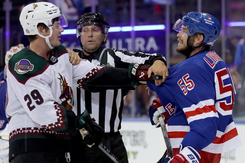 Oct 16, 2023; New York, New York, USA; Arizona Coyotes center Barrett Hayton (29) and New York Rangers defenseman Ryan Lindgren (55) are separated by linesman Jonny Murray (95) during a fight after the Rangers defeated the Coyotes 2-1 at Madison Square Garden. Mandatory Credit: Brad Penner-USA TODAY Sports