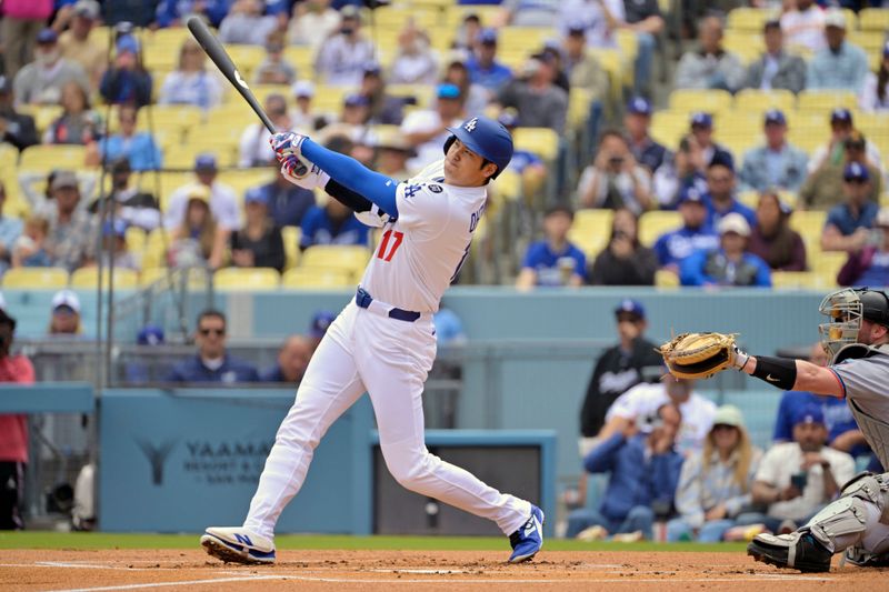Apr 30, 2025; Los Angeles, California, USA; Los Angeles Dodgers designated hitter Shohei Ohtani (17) flies out against the Miami Marlins during the first inning at Dodger Stadium. Mandatory Credit: Jayne Kamin-Oncea-Imagn Images