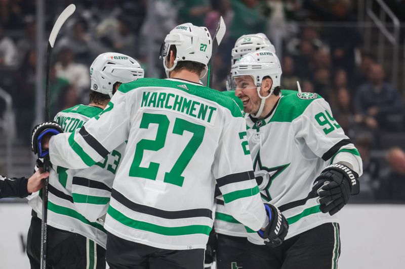 Mar 9, 2024; Los Angeles, California, USA; Members of the Dallas Stars celebrate after Dallas Stars center Wyatt Johnston (53) scored a goal during the third period of a game against the Los Angeles Kings at Crypto.com Arena. Mandatory Credit: Yannick Peterhans-USA TODAY Sports