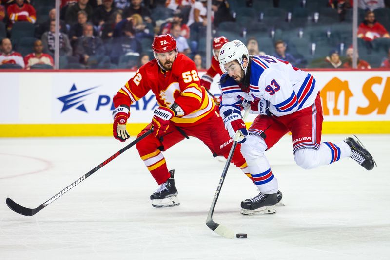 Oct 24, 2023; Calgary, Alberta, CAN; New York Rangers center Mika Zibanejad (93) and Calgary Flames defenseman MacKenzie Weegar (52) battle for the puck during the third period at Scotiabank Saddledome. Mandatory Credit: Sergei Belski-USA TODAY Sports