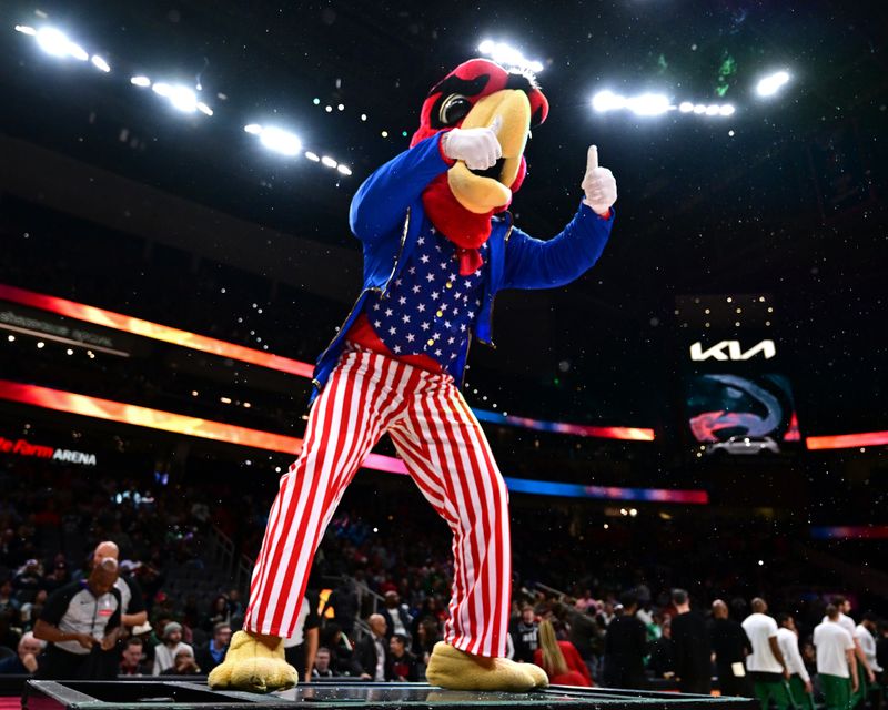 ATLANTA, GA - NOVEMBER 4: Mascot Henry the Hawk of the Atlanta Hawks celebrates before the game against the Boston Celtics on November 4, 2024 at State Farm Arena in Atlanta, Georgia.  NOTE TO USER: User expressly acknowledges and agrees that, by downloading and/or using this Photograph, user is consenting to the terms and conditions of the Getty Images License Agreement. Mandatory Copyright Notice: Copyright 2024 NBAE (Photo by Adam Hagy/NBAE via Getty Images)