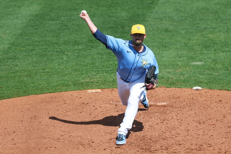 Mar 7, 2024; Port Charlotte, Florida, USA;  Tampa Bay Rays relief pitcher Shawn Armstrong (64) throws a pitch against the Philadelphia Phillies in the third inning at Charlotte Sports Park. Mandatory Credit: Nathan Ray Seebeck-USA TODAY Sports