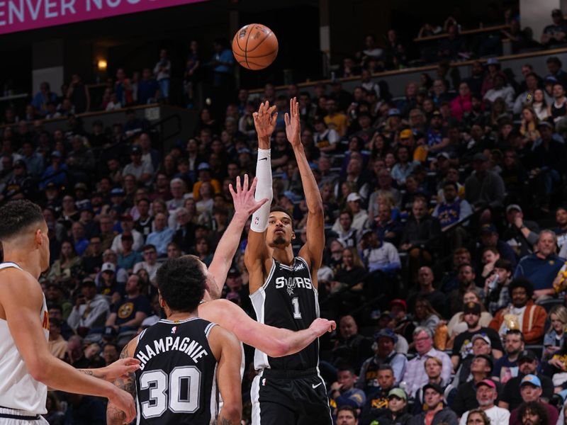 DENVER, CO - APRIL 2: Victor Wembanyama #1 of the San Antonio Spurs shoots the ball during the game against the Denver Nuggets on April 2, 2024 at the Ball Arena in Denver, Colorado. NOTE TO USER: User expressly acknowledges and agrees that, by downloading and/or using this Photograph, user is consenting to the terms and conditions of the Getty Images License Agreement. Mandatory Copyright Notice: Copyright 2024 NBAE (Photo by Bart Young/NBAE via Getty Images)