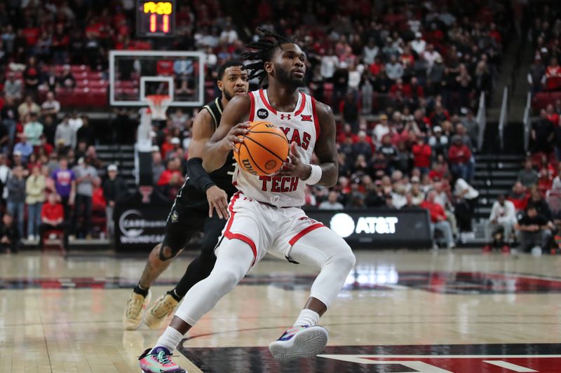 Feb 10, 2024; Lubbock, Texas, USA; Texas Tech Red Raiders guard Joe Toussaint (6) goes to the basket against Central Florida Knights guard Darius Johnson (3) in the first half United Supermarkets Arena. Mandatory Credit: Michael C. Johnson-USA TODAY Sports