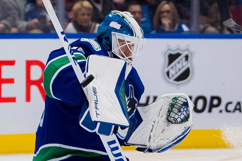 Dec 28, 2023; Vancouver, British Columbia, CAN; Vancouver Canucks goalie Casey DeSmith (29) makes a save against the Philadelphia Flyers in the second period at Rogers Arena. Mandatory Credit: Bob Frid-USA TODAY Sports