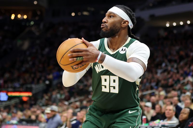 MILWAUKEE, WISCONSIN - FEBRUARY 09: Jae Crowder #99 of the Milwaukee Bucks takes a shot during a game against the Charlotte Hornets at Fiserv Forum on February 09, 2024 in Milwaukee, Wisconsin. NOTE TO USER: User expressly acknowledges and agrees that, by downloading and or using this photograph, User is consenting to the terms and conditions of the Getty Images License Agreement. (Photo by Stacy Revere/Getty Images)