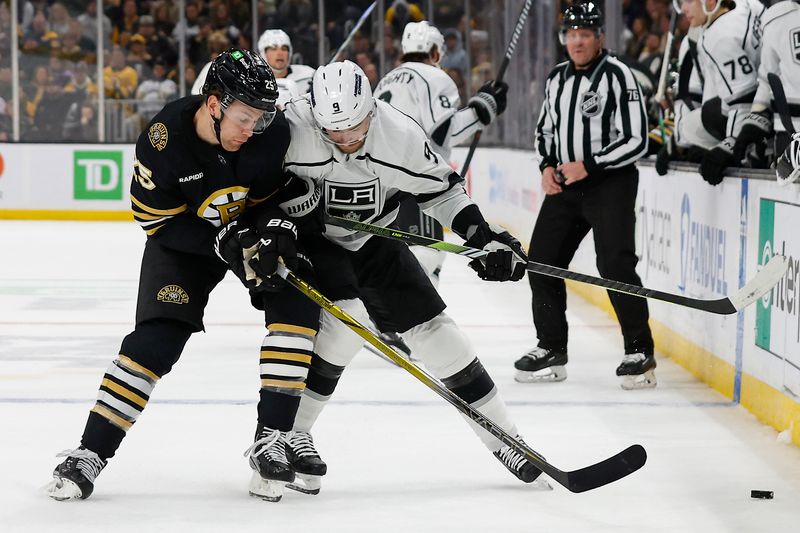 Feb 17, 2024; Boston, Massachusetts, USA; Boston Bruins defenseman Brandon Carlo (25) tries to check Los Angeles Kings right wing Adrian Kempe (9) off the puck during the second period at TD Garden. Mandatory Credit: Winslow Townson-USA TODAY Sports