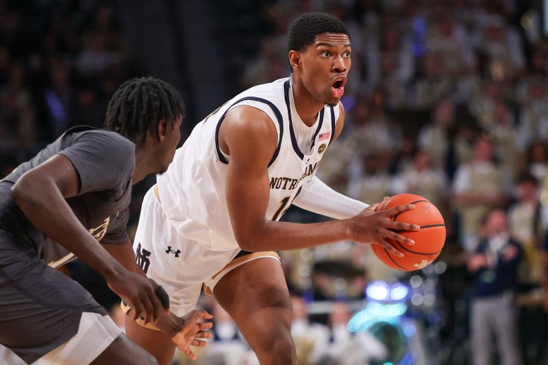 Jan 9, 2024; Atlanta, Georgia, USA; Notre Dame Fighting Irish forward Kebba Njie (14) looks to pass against the Georgia Tech Yellow Jackets in the first half at McCamish Pavilion. Mandatory Credit: Brett Davis-USA TODAY Sports