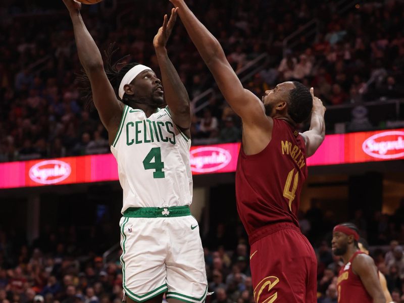 CLEVELAND, OH - DECEMBER 1: Jrue Holiday #4 of the Boston Celtics shoots the ball during the game against the Cleveland Cavaliers on December 1, 2024 at Rocket Mortgage FieldHouse in Cleveland, Ohio. NOTE TO USER: User expressly acknowledges and agrees that, by downloading and/or using this Photograph, user is consenting to the terms and conditions of the Getty Images License Agreement. Mandatory Copyright Notice: Copyright 2024 NBAE (Photo by  Lauren Leigh Bacho/NBAE via Getty Images)