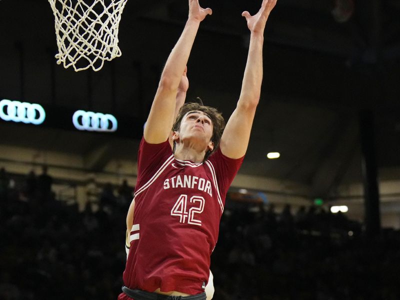 Mar 3, 2024; Boulder, Colorado, USA; Stanford Cardinal forward Maxime Raynaud (42) reaches for the ball in the second half against the Colorado Buffaloes at the CU Events Center. Mandatory Credit: Ron Chenoy-USA TODAY Sports