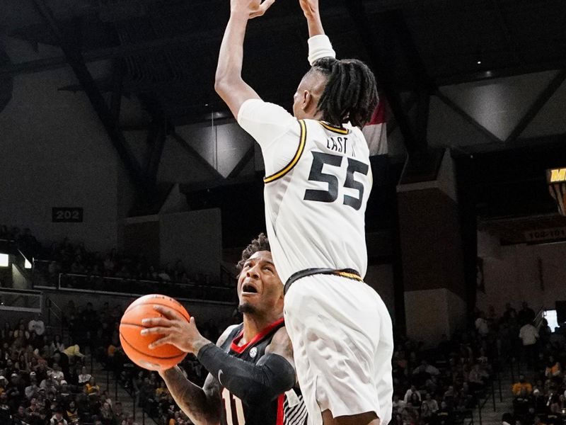 Jan 6, 2024; Columbia, Missouri, USA; Georgia Bulldogs guard Justin Hill (11) waits to shoot as Missouri Tigers guard Sean East II (55) defends during the first half at Mizzou Arena. Mandatory Credit: Denny Medley-USA TODAY Sports