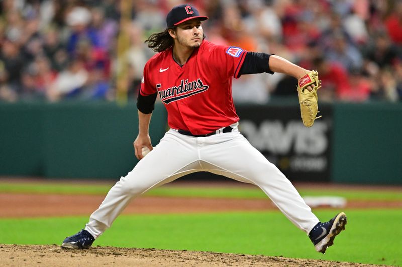 Sep 1, 2023; Cleveland, Ohio, USA; Cleveland Guardians relief pitcher Eli Morgan (49) throws a pitch during the seventh inning against the Tampa Bay Rays at Progressive Field. Mandatory Credit: Ken Blaze-USA TODAY Sports