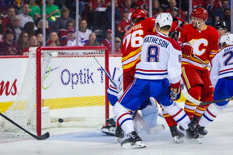 Mar 16, 2024; Calgary, Alberta, CAN; Calgary Flames center Martin Pospisil (76) scores a goal against the Montreal Canadiens during the second period at Scotiabank Saddledome. Mandatory Credit: Sergei Belski-USA TODAY Sports