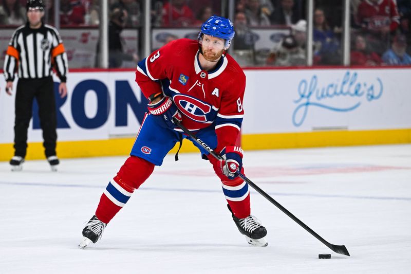 Feb 13, 2024; Montreal, Quebec, CAN; Montreal Canadiens defenseman Mike Matheson (8) plays the puck against the Anaheim Ducks during the second period at Bell Centre. Mandatory Credit: David Kirouac-USA TODAY Sports