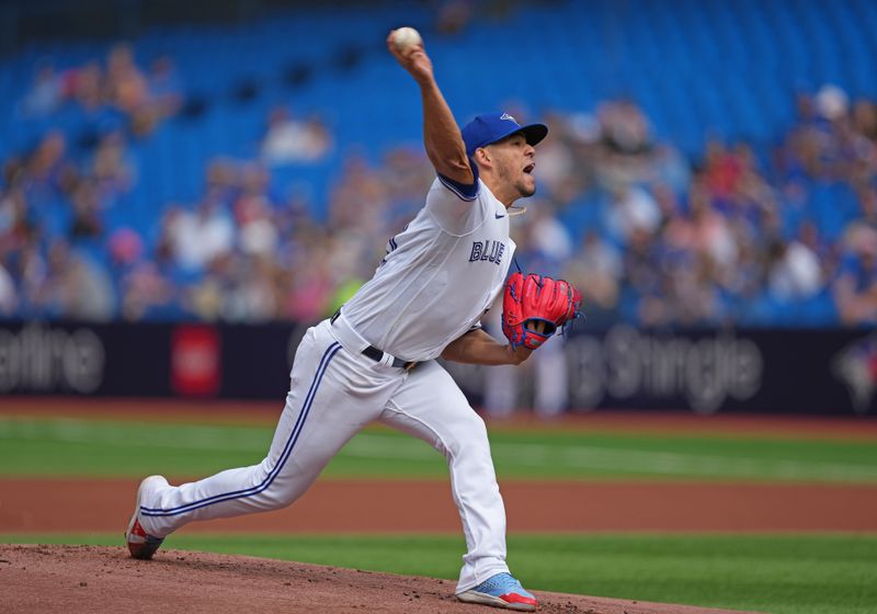 Sep 10, 2023; Toronto, Ontario, CAN; Toronto Blue Jays starting pitcher Jose Berrios (17) throws a pitch against the Kansas City Royals during the first inning at Rogers Centre. Mandatory Credit: Nick Turchiaro-USA TODAY Sports