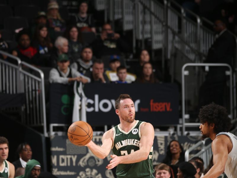 MILWAUKEE, WI - FEBRUARY 8: Pat Connaughton #24 of the Milwaukee Bucks passes the ball during the game against the Minnesota Timberwolves on February 8, 2024 at the Fiserv Forum Center in Milwaukee, Wisconsin. NOTE TO USER: User expressly acknowledges and agrees that, by downloading and or using this Photograph, user is consenting to the terms and conditions of the Getty Images License Agreement. Mandatory Copyright Notice: Copyright 2024 NBAE (Photo by Gary Dineen/NBAE via Getty Images).