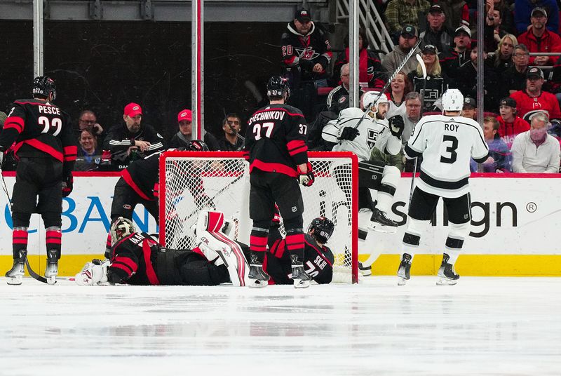 Jan 15, 2024; Raleigh, North Carolina, USA; Los Angeles Kings center Phillip Danault (24) celebrates his goal against the Carolina Hurricanes during the third period at PNC Arena. Mandatory Credit: James Guillory-USA TODAY Sports