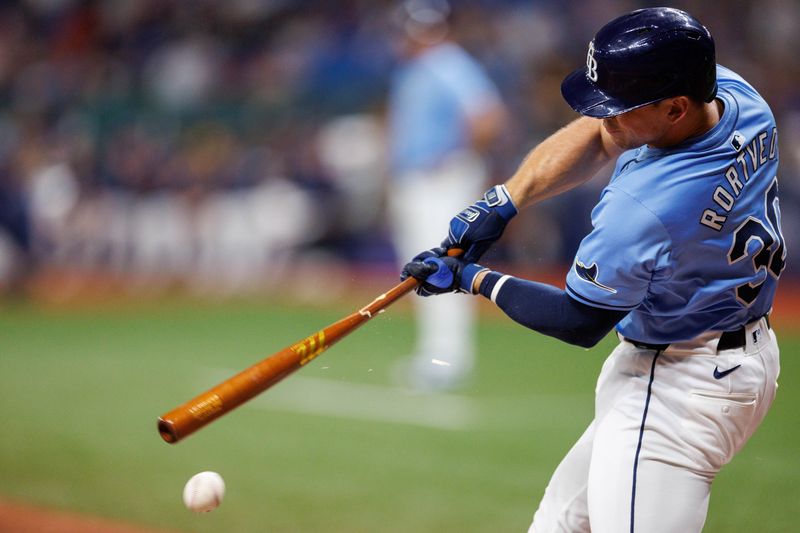 Jun 13, 2024; St. Petersburg, Florida, USA;  Tampa Bay Rays catcher Ben Rortvedt (30) breaks his bat on a rbi ground out against the Chicago Cubs in the seventh inning at Tropicana Field. Mandatory Credit: Nathan Ray Seebeck-USA TODAY Sports