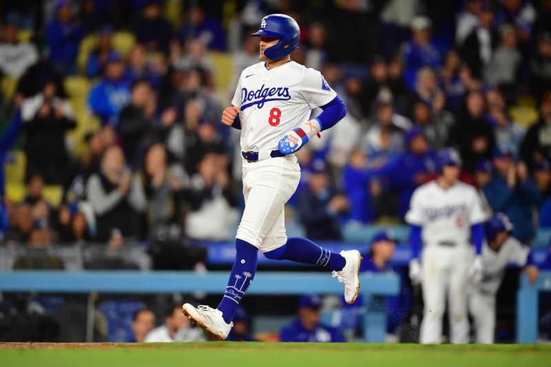 Apr 13, 2024; Los Angeles, California, USA; Los Angeles Dodgers left fielder Enrique Hernandez (8) scores a run against the San Diego Padres during the sixth inning at Dodger Stadium. Mandatory Credit: Gary A. Vasquez-USA TODAY Sports