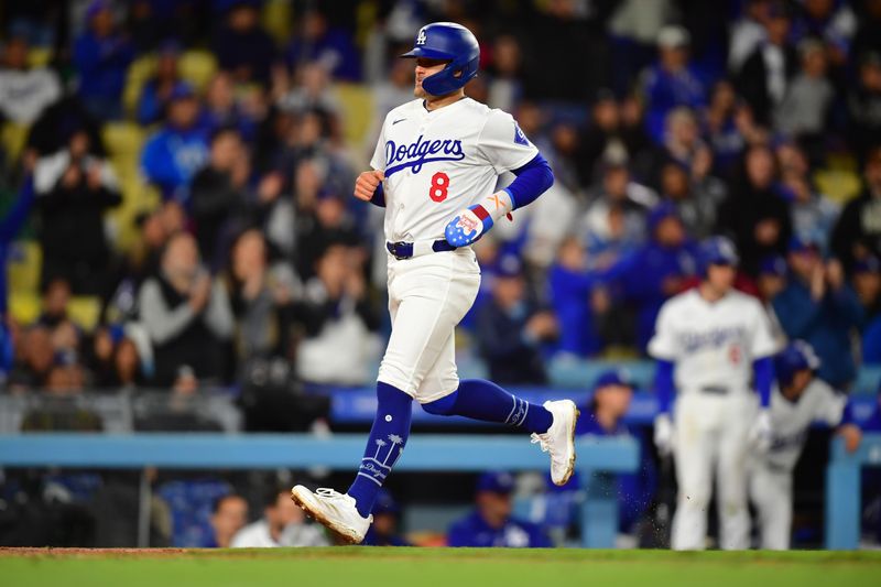 Apr 13, 2024; Los Angeles, California, USA; Los Angeles Dodgers left fielder Enrique Hernandez (8) scores a run against the San Diego Padres during the sixth inning at Dodger Stadium. Mandatory Credit: Gary A. Vasquez-USA TODAY Sports