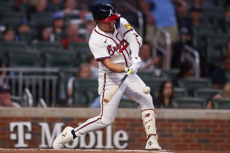 Sep 22, 2025; Atlanta, Georgia, USA; Atlanta Braves shortstop Ha-Seong Kim (9) hits a single against the Washington Nationals in the second inning at Truist Park. Mandatory Credit: Brett Davis-Imagn Images
