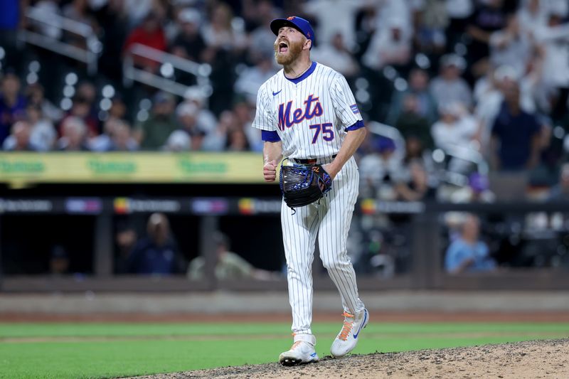 Jun 25, 2024; New York City, New York, USA; New York Mets relief pitcher Reed Garrett (75) reacts after getting the final out against the New York Yankees at Citi Field. Mandatory Credit: Brad Penner-USA TODAY Sports