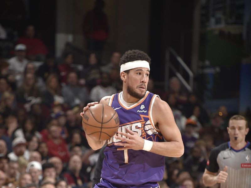 CLEVELAND, OH - MARCH 11: Devin Booker #1 of the Phoenix Suns handles the ball during the game against the Cleveland Cavaliers on March 11, 2024 at Rocket Mortgage FieldHouse in Cleveland, Ohio. NOTE TO USER: User expressly acknowledges and agrees that, by downloading and/or using this Photograph, user is consenting to the terms and conditions of the Getty Images License Agreement. Mandatory Copyright Notice: Copyright 2024 NBAE (Photo by David Liam Kyle/NBAE via Getty Images)