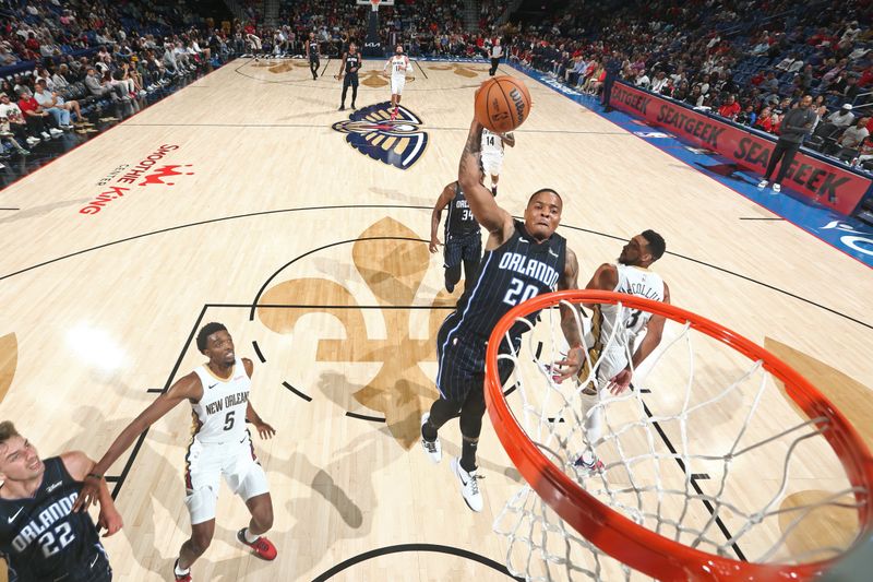 NEW ORLEANS, LA - OCTOBER 10: Markelle Fultz #20 of the Orlando Magic dunks the ball during the game against the New Orleans Pelicans on October 10, 2023 at the Smoothie King Center in New Orleans, Louisiana. NOTE TO USER: User expressly acknowledges and agrees that, by downloading and or using this Photograph, user is consenting to the terms and conditions of the Getty Images License Agreement. Mandatory Copyright Notice: Copyright 2023 NBAE (Photo by Layne Murdoch Jr./NBAE via Getty Images)