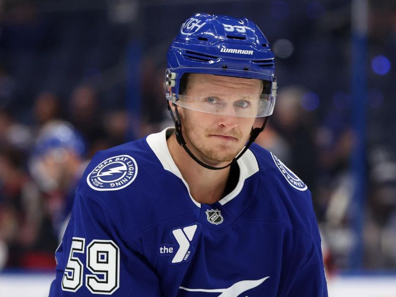 Oct 9, 2025; Tampa, Florida, USA;  Tampa Bay Lightning center Jake Guentzel (59) works out prior to the game against the Ottawa Senators at Benchmark International Arena. Mandatory Credit: Kim Klement Neitzel-Imagn Images