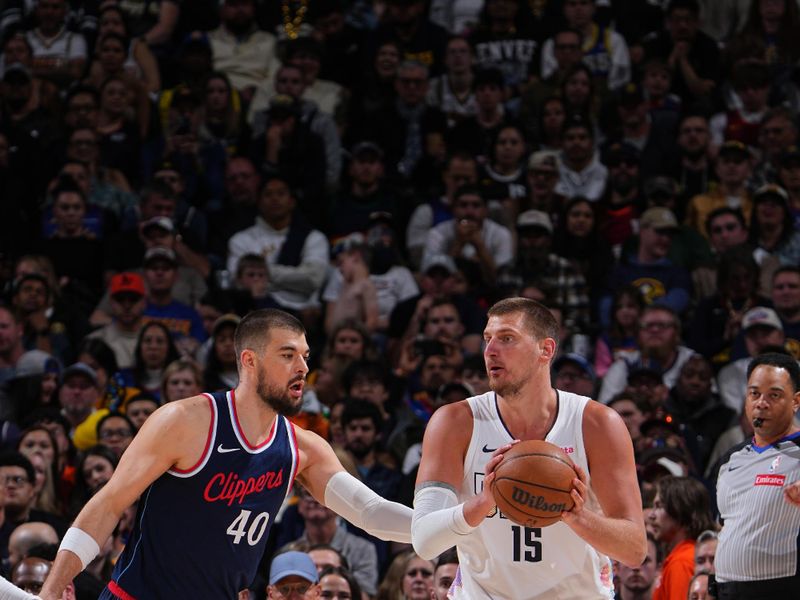 DENVER, CO - APRIL 29:  Ivica Zubac #40 of the LA Clippers plays defense during the game against Nikola Jokic #15 of the Denver Nuggets on April 29, 2025 at Ball Arena in Denver, Colorado. NOTE TO USER: User expressly acknowledges and agrees that, by downloading and/or using this Photograph, user is consenting to the terms and conditions of the Getty Images License Agreement. Mandatory Copyright Notice: Copyright 2025 NBAE (Photo by Garrett Ellwood/NBAE via Getty Images)