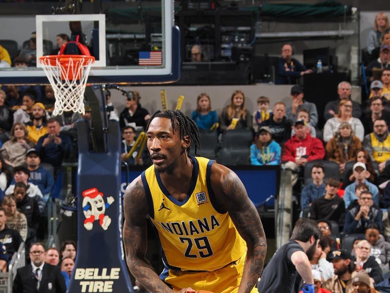 INDIANAPOLIS, IN - NOVEMBER 29:  Quenton Jackson #29 of the Indiana Pacers handles the ball during the game against the Detroit Pistons during the Emirates NBA Cup game on November 29, 2024 at Gainbridge Fieldhouse in Indianapolis, Indiana. NOTE TO USER: User expressly acknowledges and agrees that, by downloading and or using this Photograph, user is consenting to the terms and conditions of the Getty Images License Agreement. Mandatory Copyright Notice: Copyright 2024 NBAE (Photo by Ron Hoskins/NBAE via Getty Images)