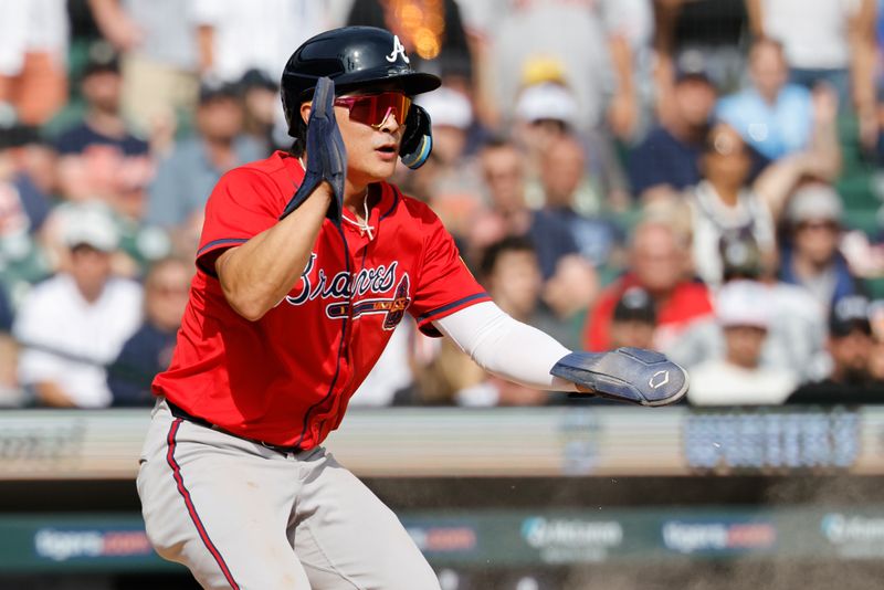 Sep 20, 2025; Detroit, Michigan, USA; Atlanta Braves shortstop Ha-Seong Kim (9) celebrates after he scores a run in the eighth inning against the Detroit Tigers at Comerica Park. Mandatory Credit: Rick Osentoski-Imagn Images