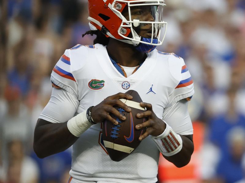 Sep 4, 2021; Gainesville, Florida, USA; Florida Gators quarterback Emory Jones (5) drop back against the Florida Atlantic Owls during the first quarter at Ben Hill Griffin Stadium. Mandatory Credit: Kim Klement-USA TODAY Sports